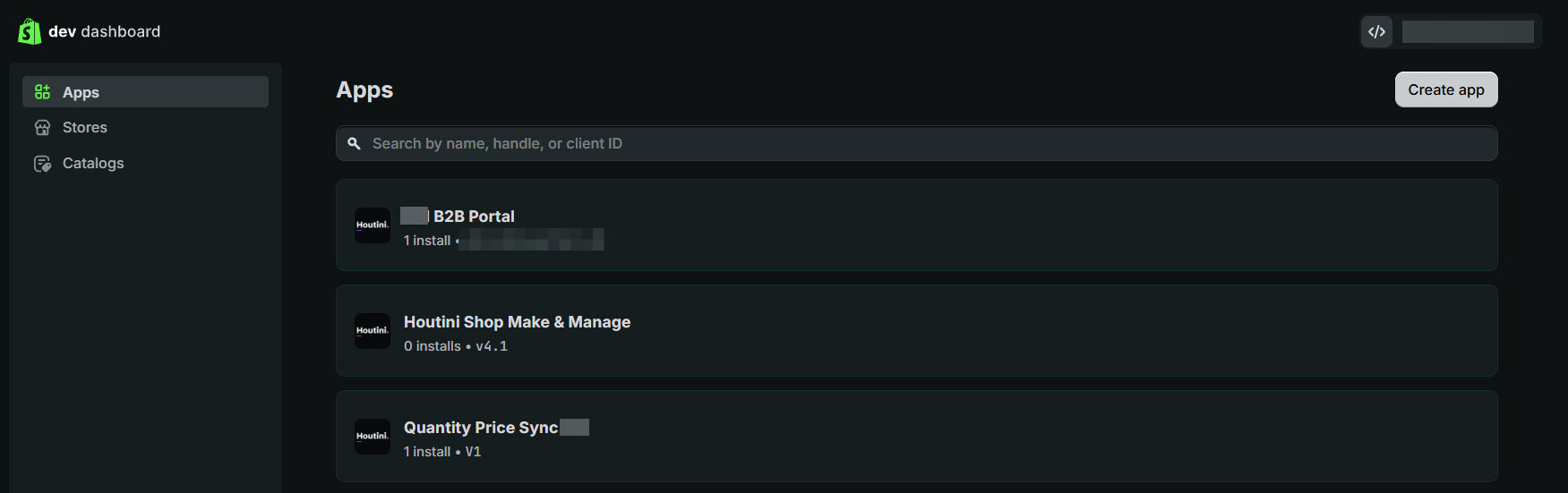 Shopify dev dashboard Apps list showing the first-party B2B portal app and the quantity price sync app, with client names blurred