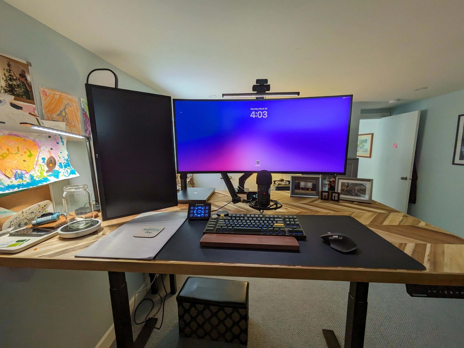 A high-end MacBook Pro M3 Max developer workstation in a home office